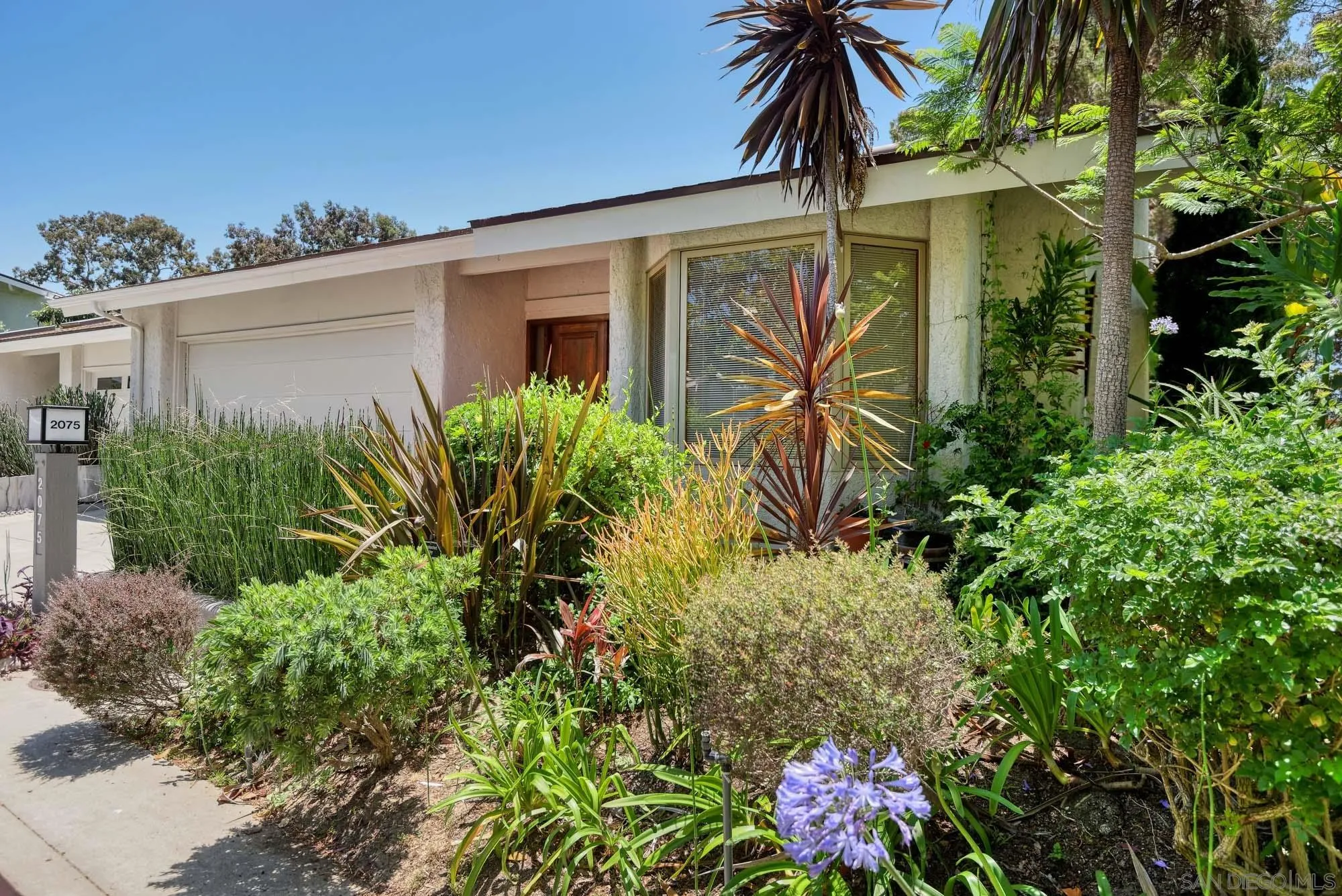 2075 Caminito Circulo Sur La Jolla, CA 92037 - Photo 18 of 26 front view of a house