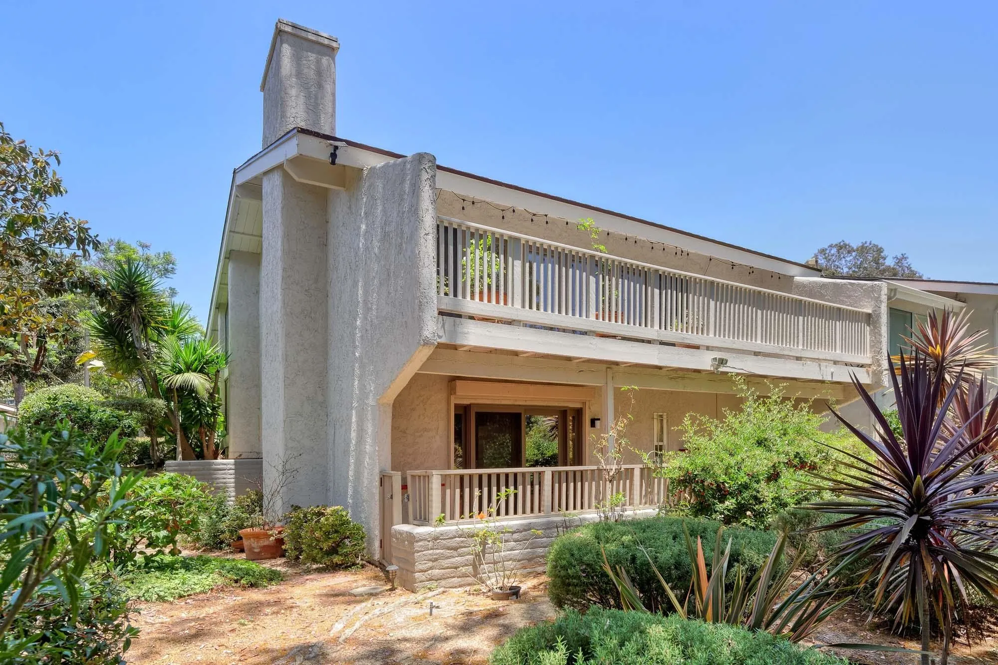 2075 Caminito Circulo Sur La Jolla, CA 92037 - Photo 26 of 26 a front view of a house with plants