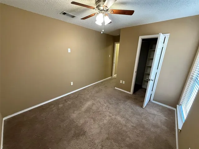 a bathroom with a tub a sink and a shower