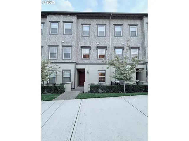 a front view of a house with yard