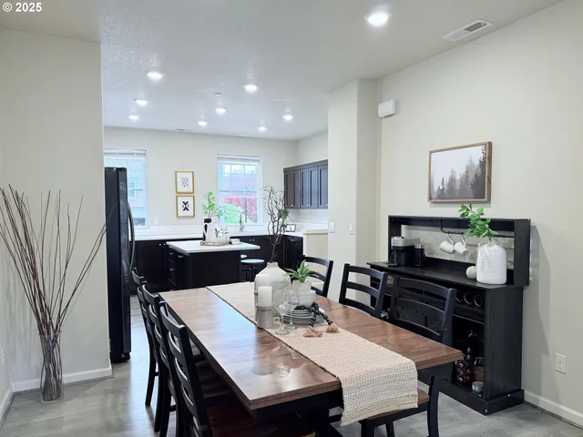 a view of a dining room with furniture