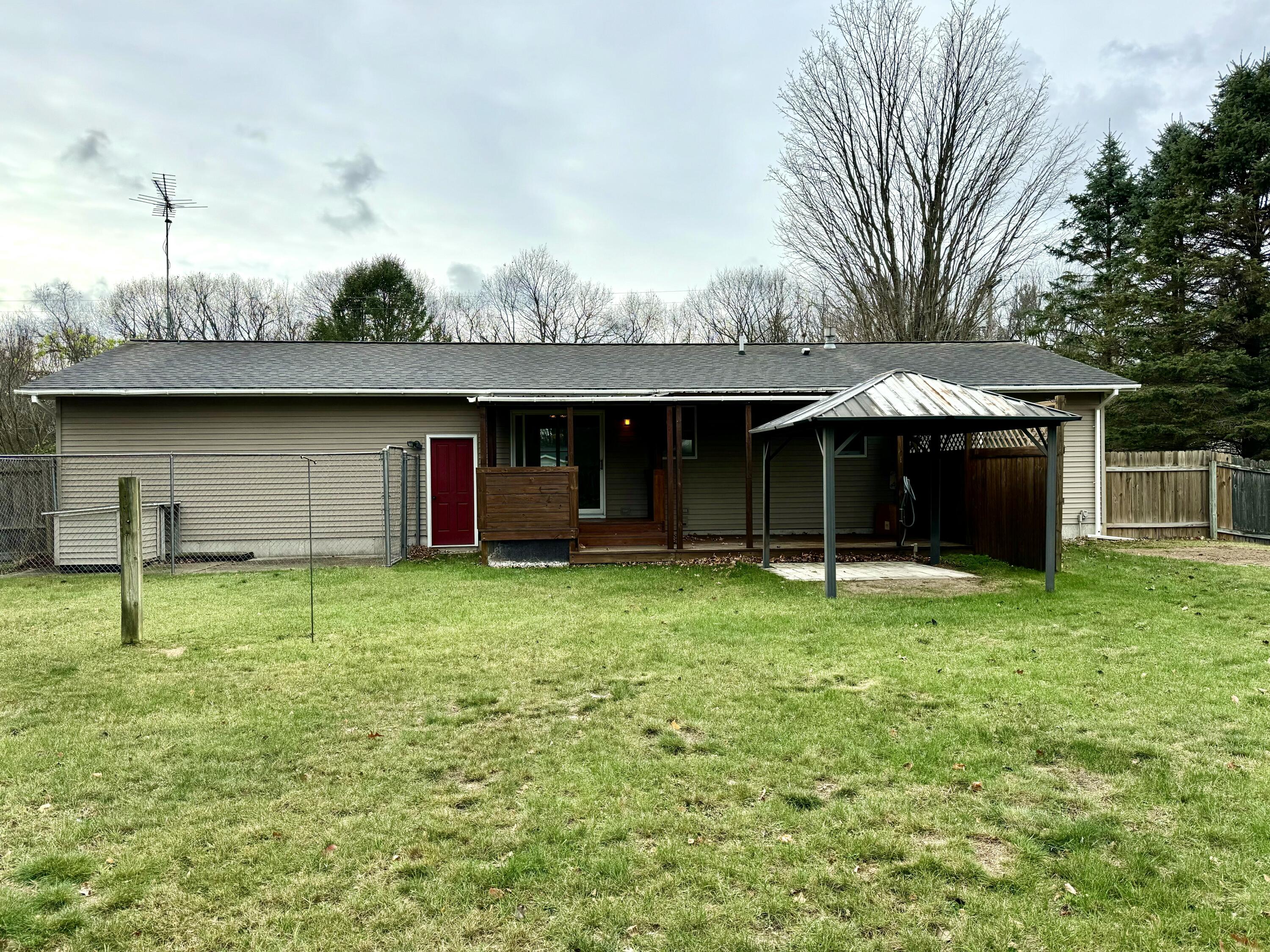1833 Guthrie Road Manistee, MI 49660 - Photo 2 of 22 Back of Home