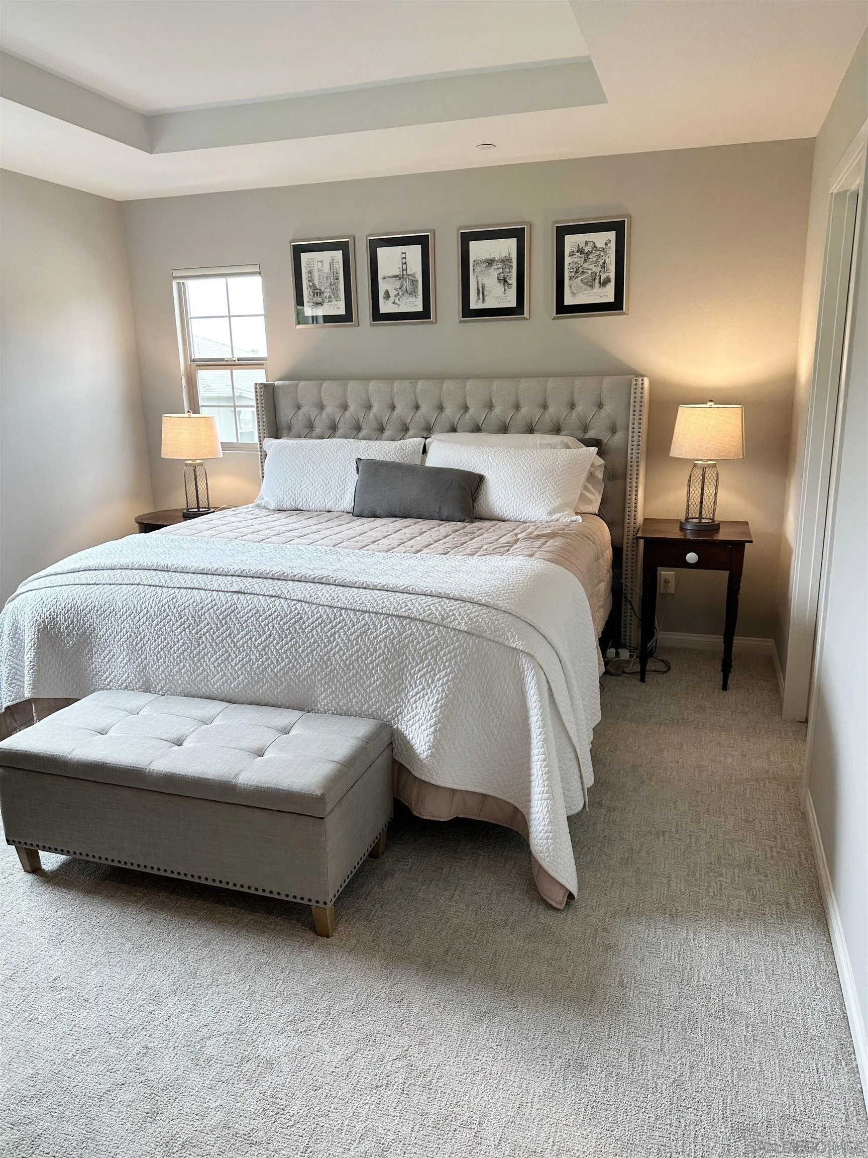 4309 Star Path Way, Unit 2 Oceanside, CA 92056 - Photo 14 of 32 a spacious bedroom with a bed and lamp