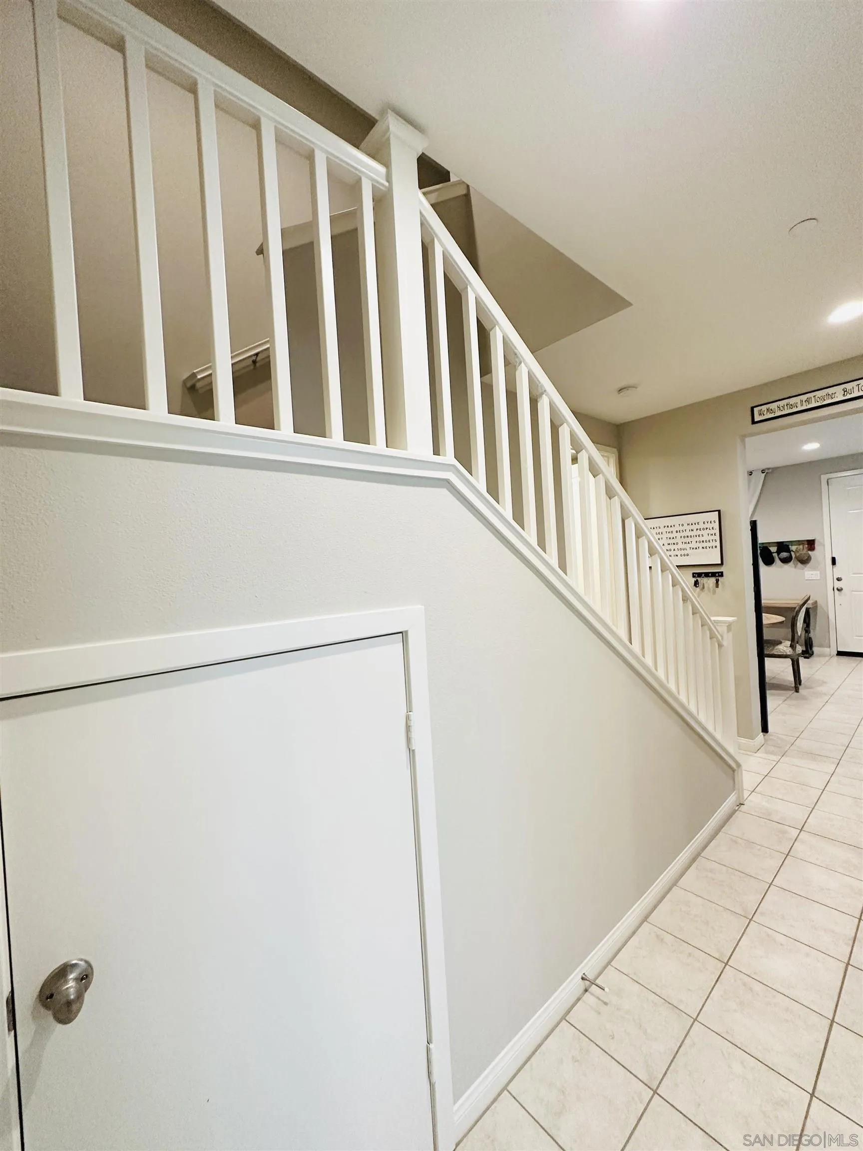 4309 Star Path Way, Unit 2 Oceanside, CA 92056 - Photo 18 of 32 a view of staircase with lots of wooden floor