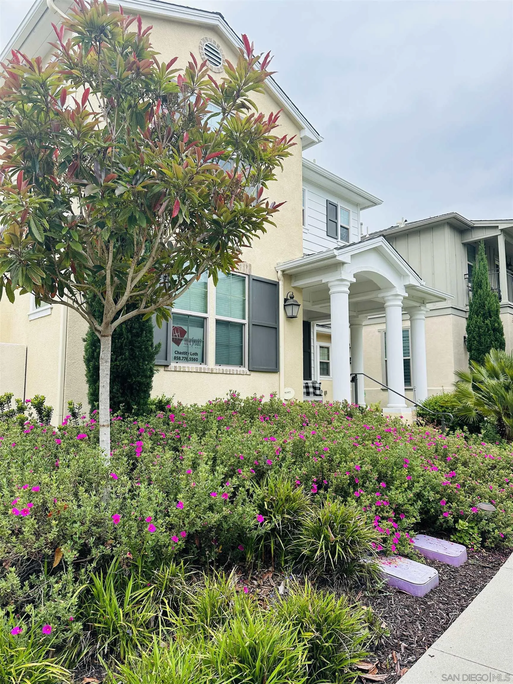 4309 Star Path Way, Unit 2 Oceanside, CA 92056 - Photo 32 of 32 front view of a house with a yard