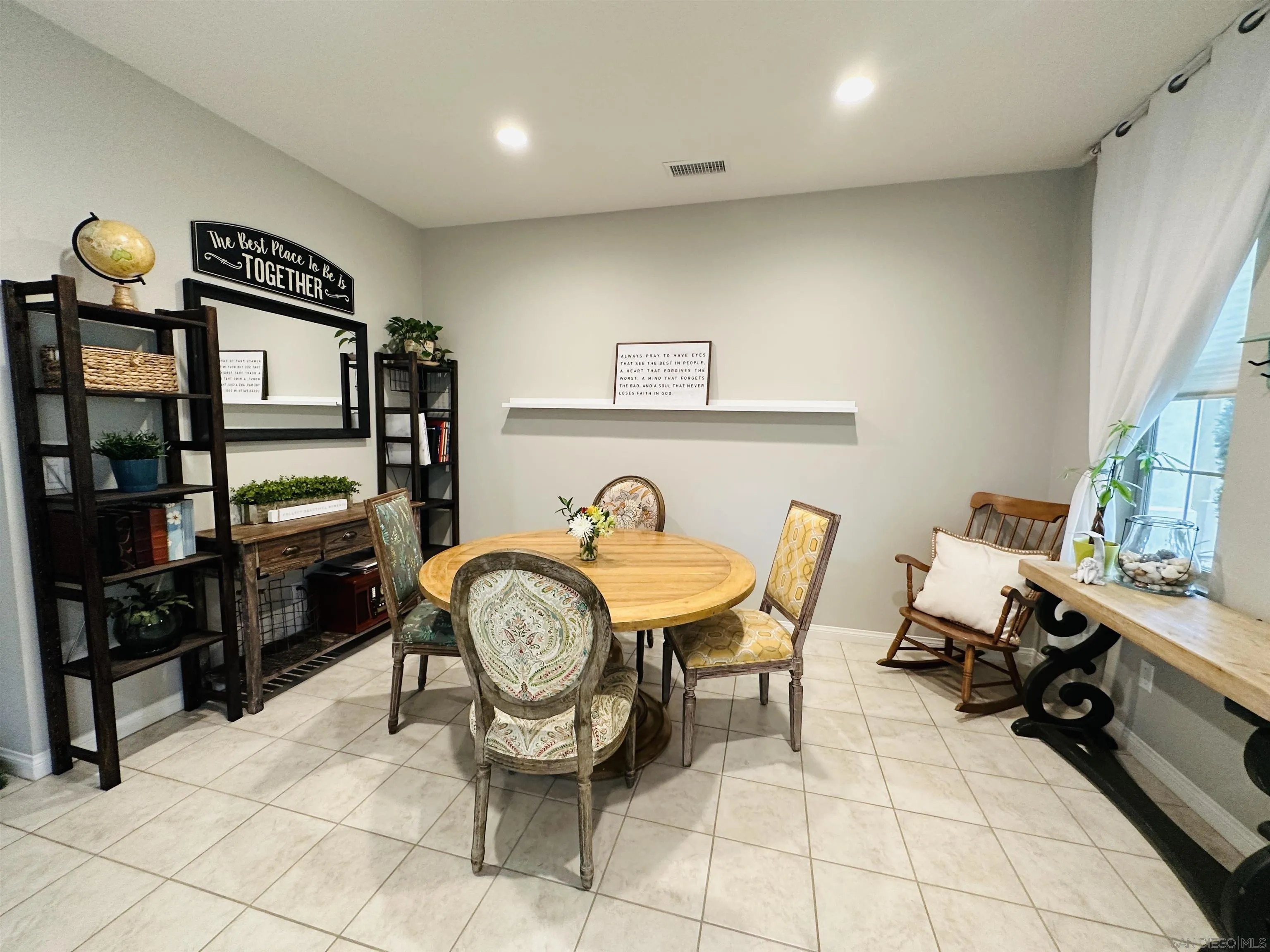 4309 Star Path Way, Unit 2 Oceanside, CA 92056 - Photo 8 of 32 a view of a chairs and a sink in a room