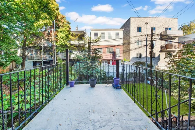 a view of a balcony with many windows