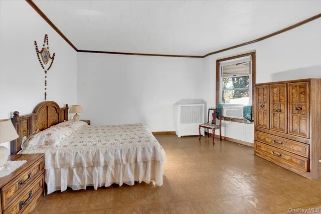 a bedroom with a bed and a table in it