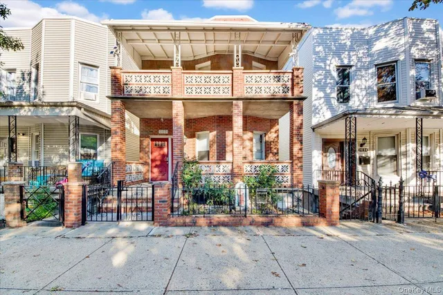 a view of a building with sitting area