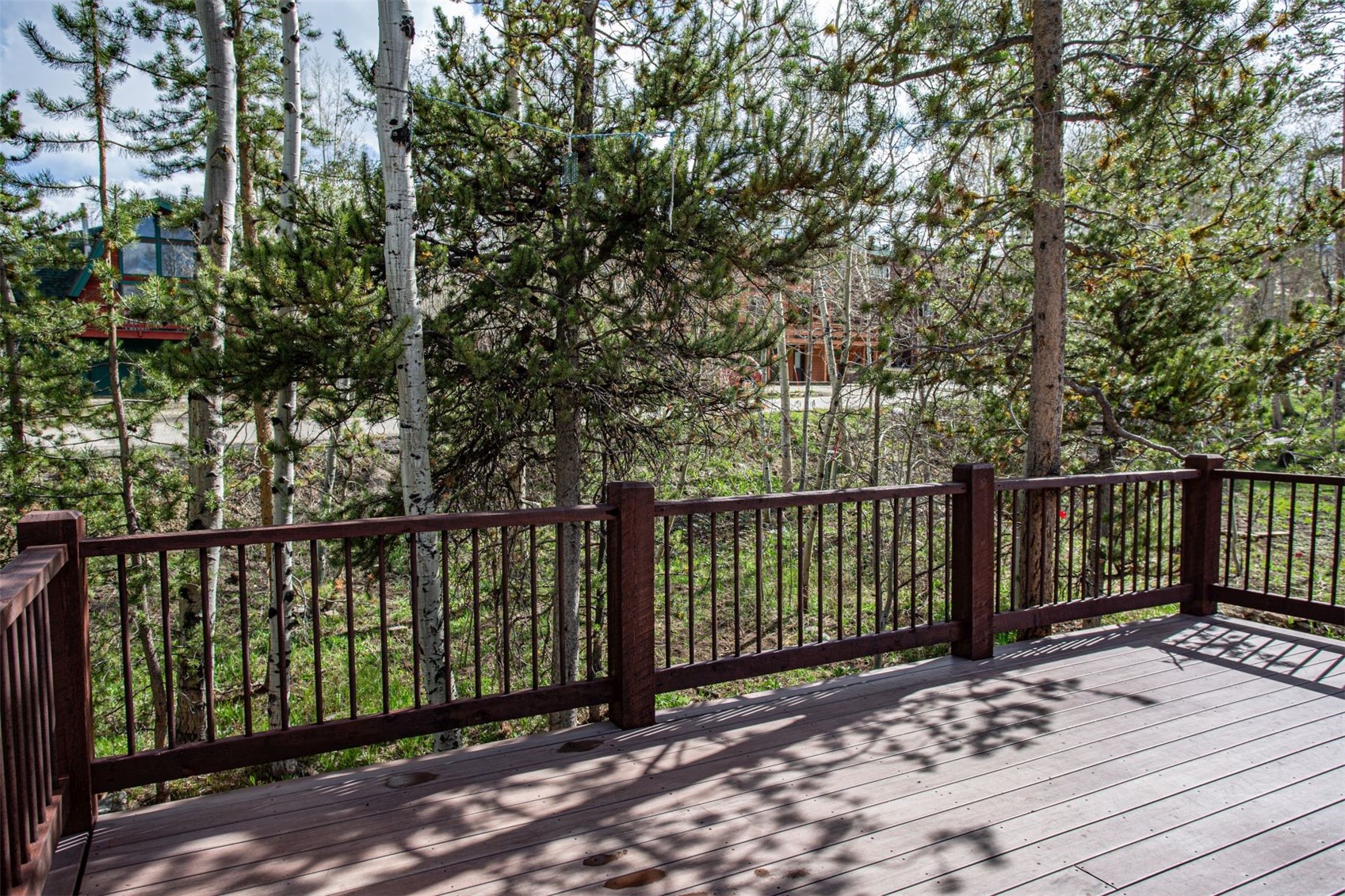 602 Ryan Gulch Road, Unit B Silverthorne, CO 80498 - Photo 14 of 34 Deck is private surrounded by trees.