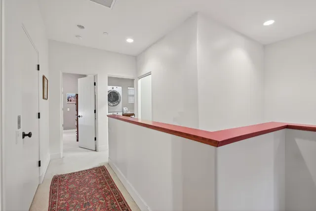 a view of a hallway with entryway