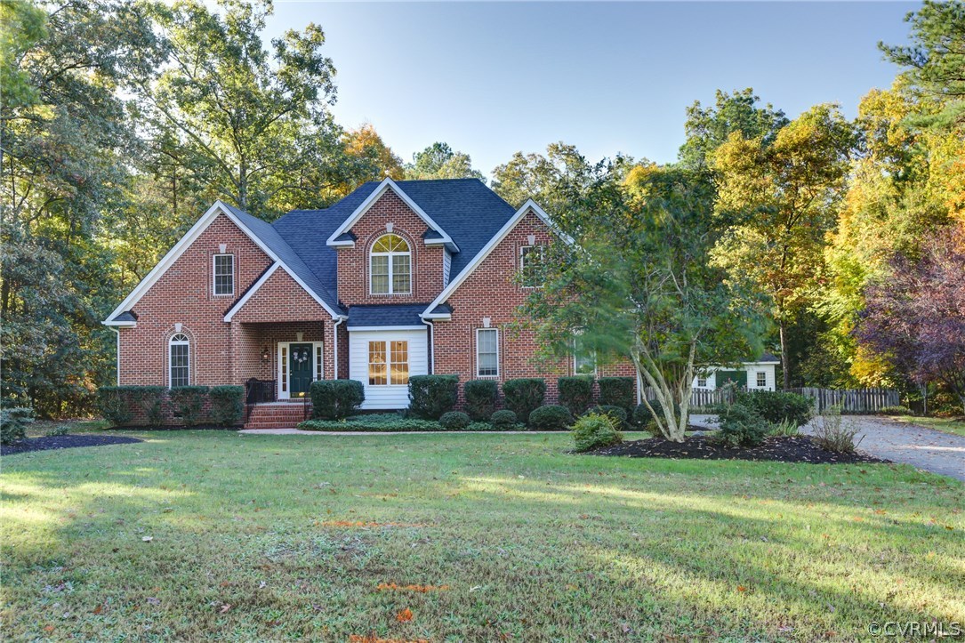 13413 Carters Valley Road Chesterfield, VA 23838 - Photo 3 of 25 a front view of a house with garden