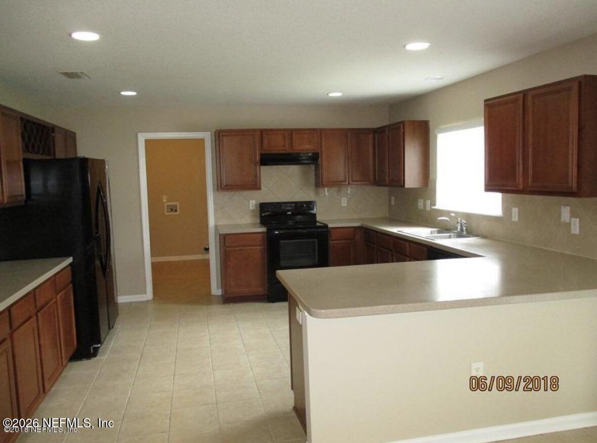86339 Cartesian Pointe Drive Yulee, FL 32097 - Photo 5 of 21 IMG_2177