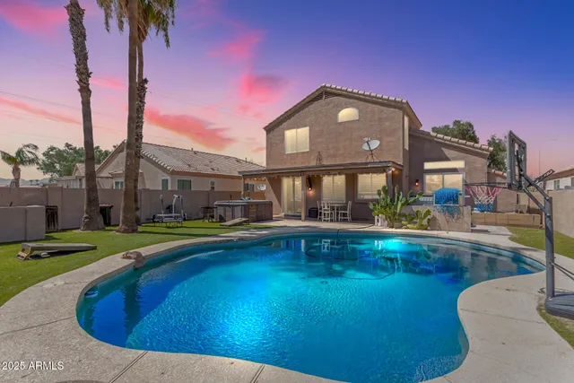 a front view of house with yard and outdoor seating