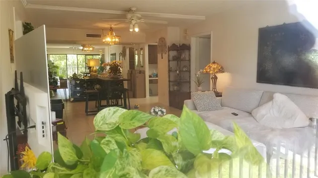 a large bedroom with a bed and glass window