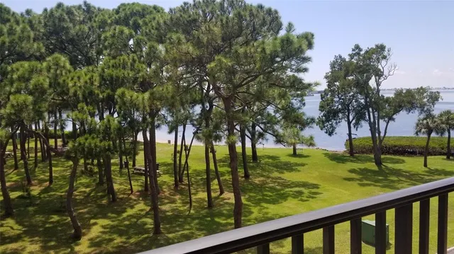 a view of swimming pool from a lake view