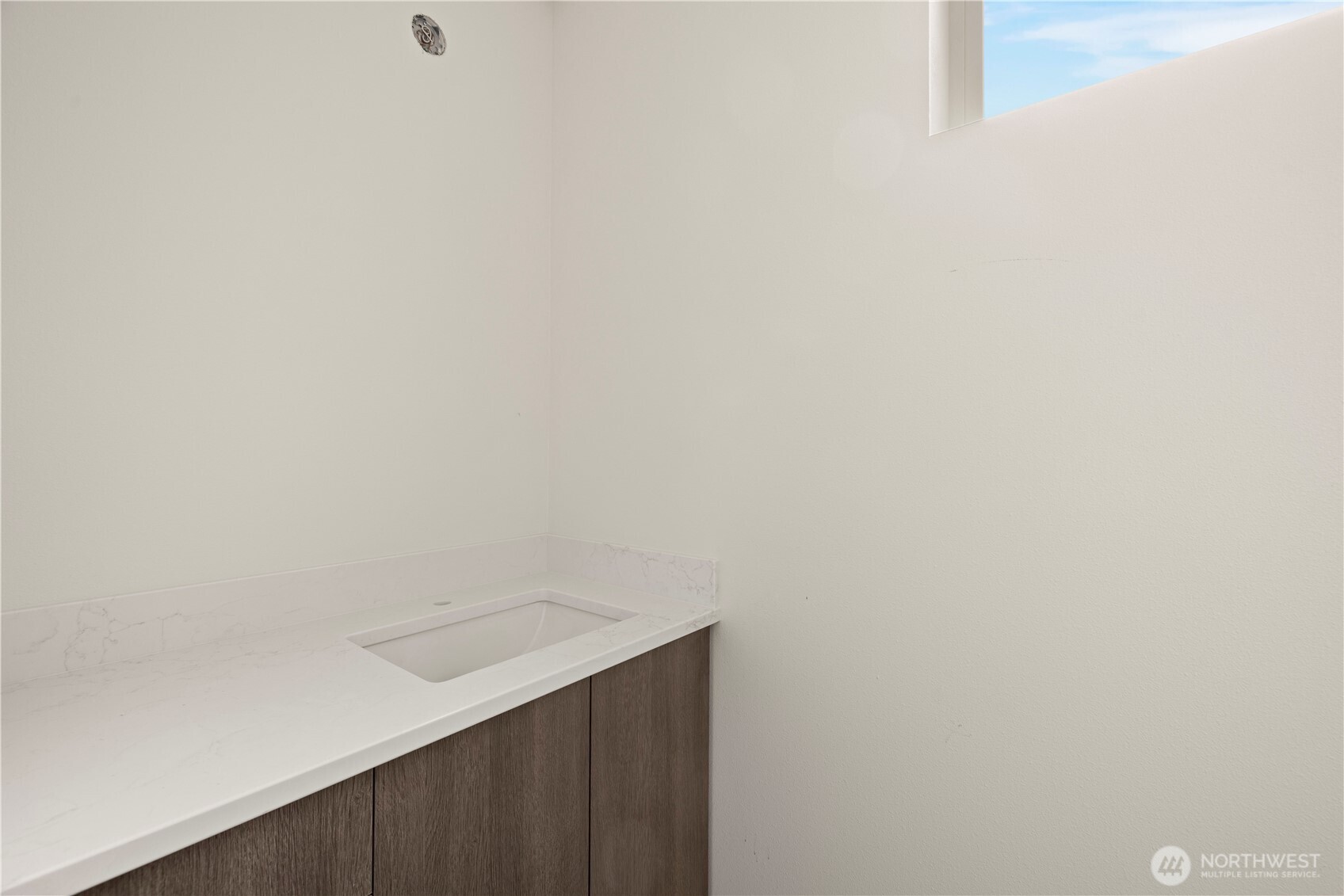 2230 Northwest 60th Street Seattle, WA 98107 - Photo 4 of 14 a view of small space with empty racks