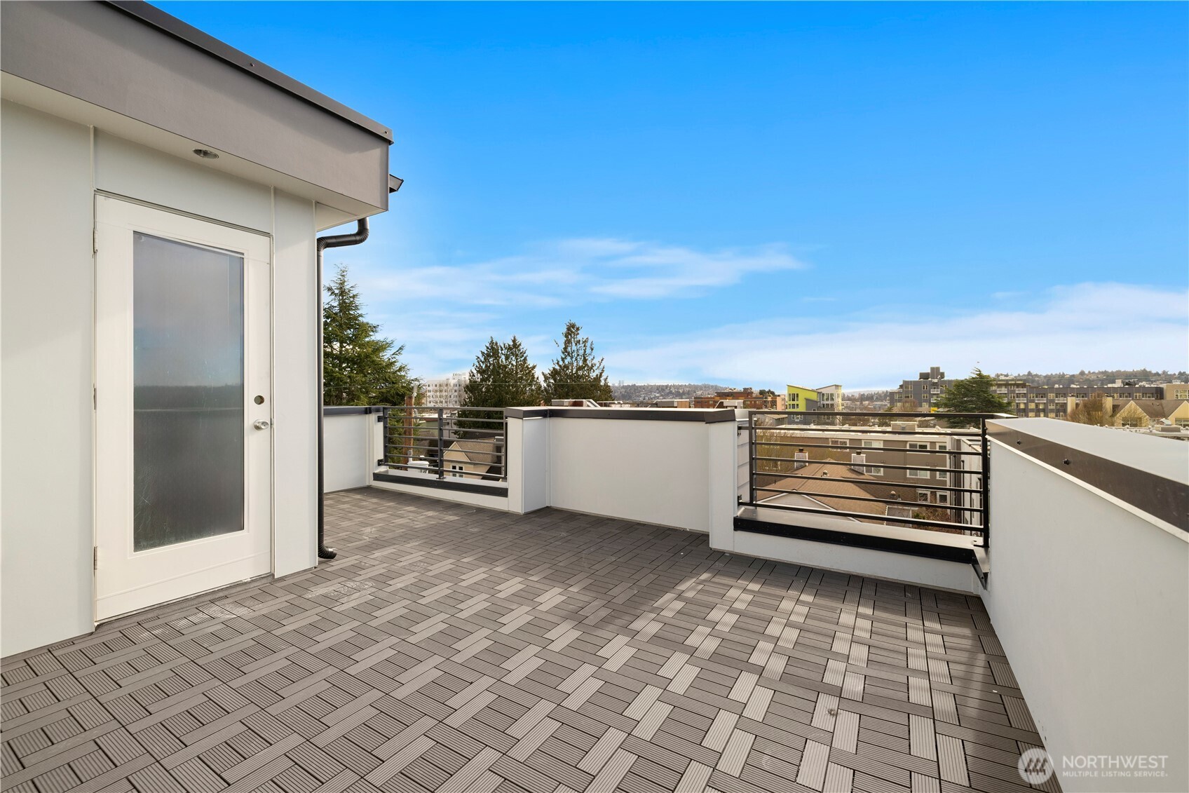 2230 Northwest 60th Street Seattle, WA 98107 - Photo 10 of 14 a view of a terrace with a bench