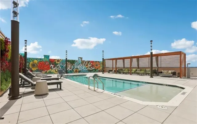 a outdoor living space with furniture and garden view