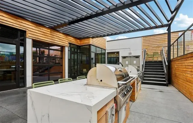 a living room with furniture a table and chairs