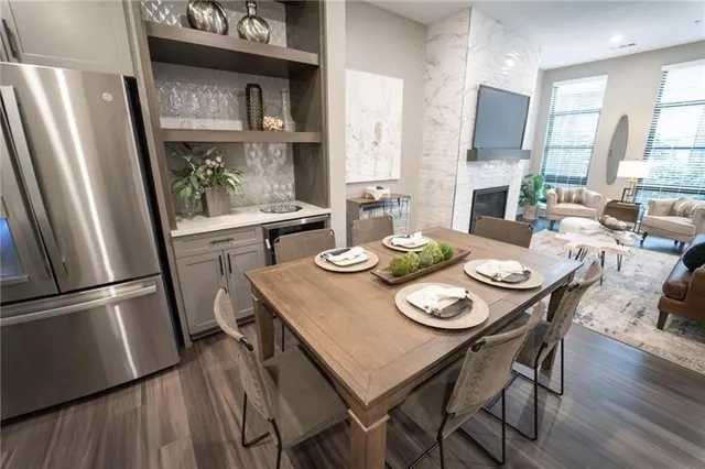 a view of a dining room with furniture window and wooden floor