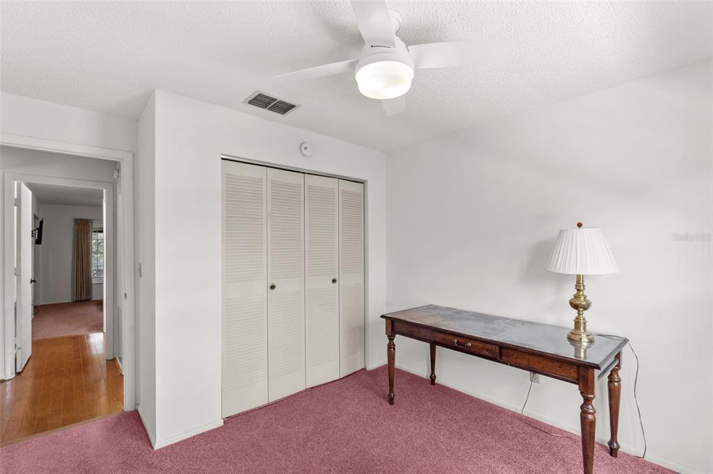 1114 Castlemay Circle Dunedin, FL 34698 - Photo 11 of 21 a view of a livingroom with furniture and wooden floor