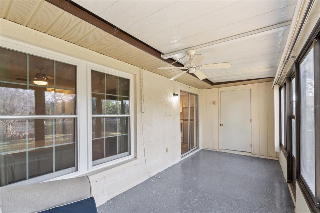 1114 Castlemay Circle Dunedin, FL 34698 - Photo 19 of 21 a view of an empty room with a window