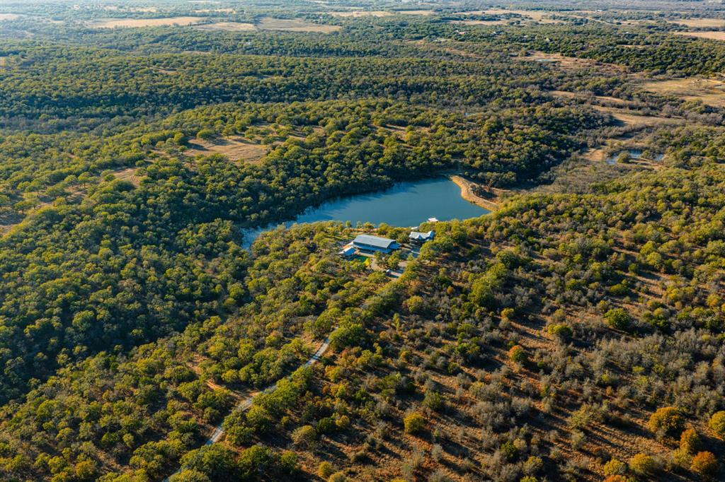 770 Sand Lane Santo, TX 76472 - Photo 3 of 40 a view of a lake with houses