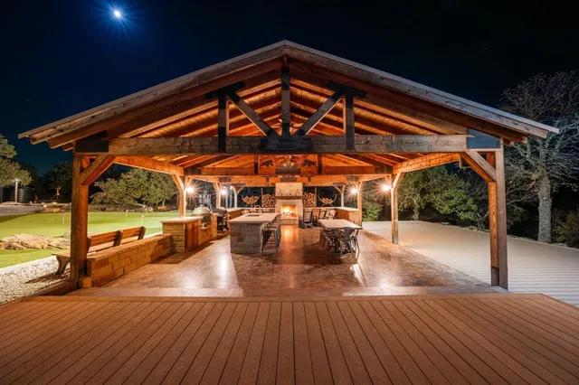 a view of parking garage with cars and other equipment