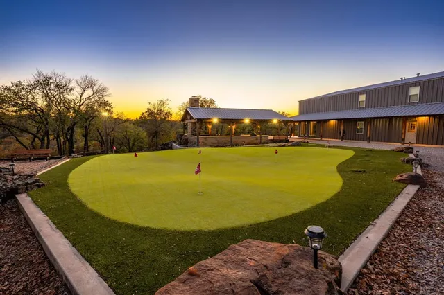 a view of a swimming pool with lounge chair