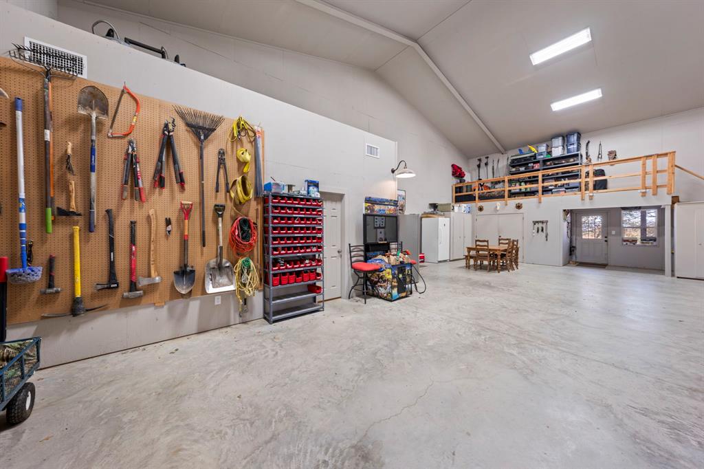 770 Sand Lane Santo, TX 76472 - Photo 36 of 40 a view of a garage with furniture