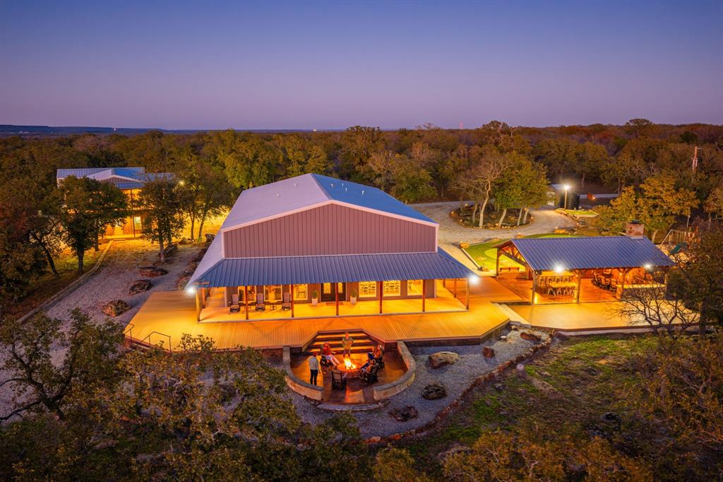 770 Sand Lane Santo, TX 76472 - Photo 5 of 40 an aerial view of residential houses with outdoor space