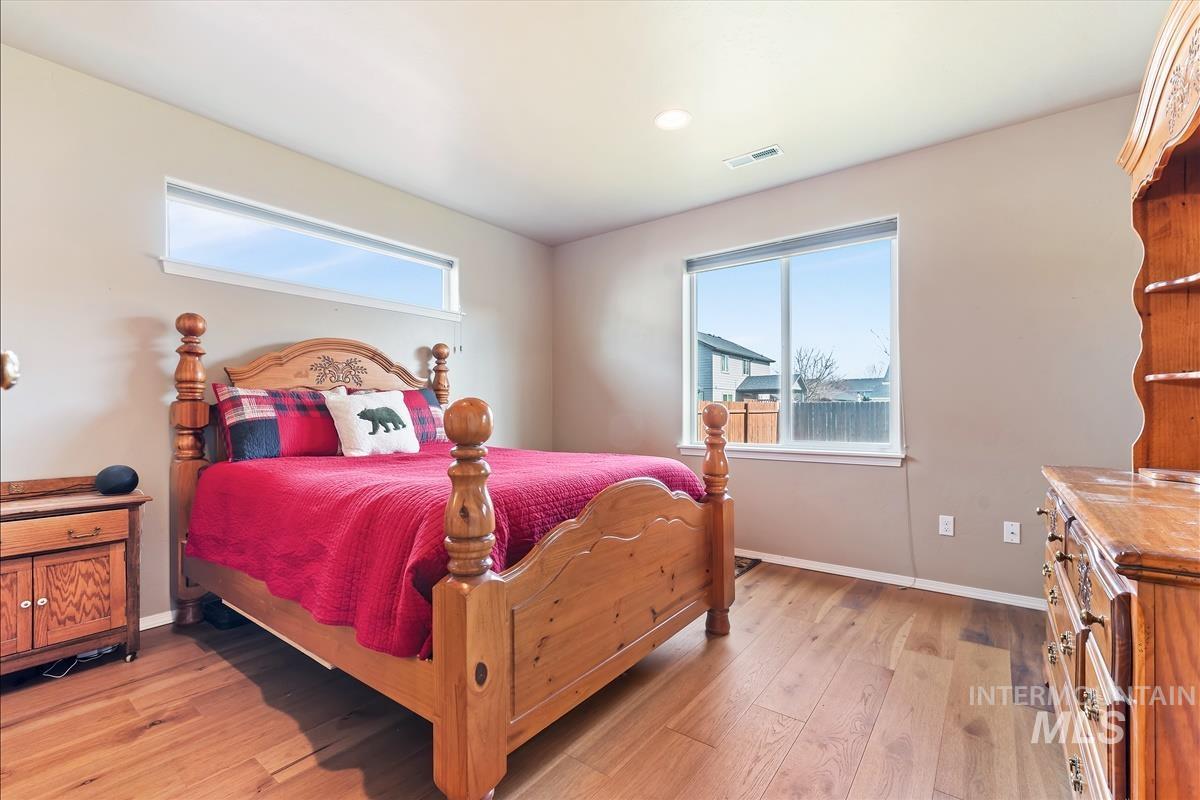 6308 South Kelso Way Boise, ID 83709 - Photo 17 of 35 Bedroom with light wood-style flooring and recessed lighting