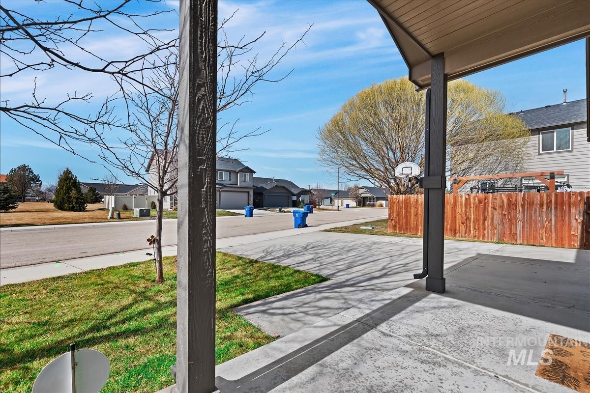 6308 South Kelso Way Boise, ID 83709 - Photo 34 of 35 View of yard featuring a residential view