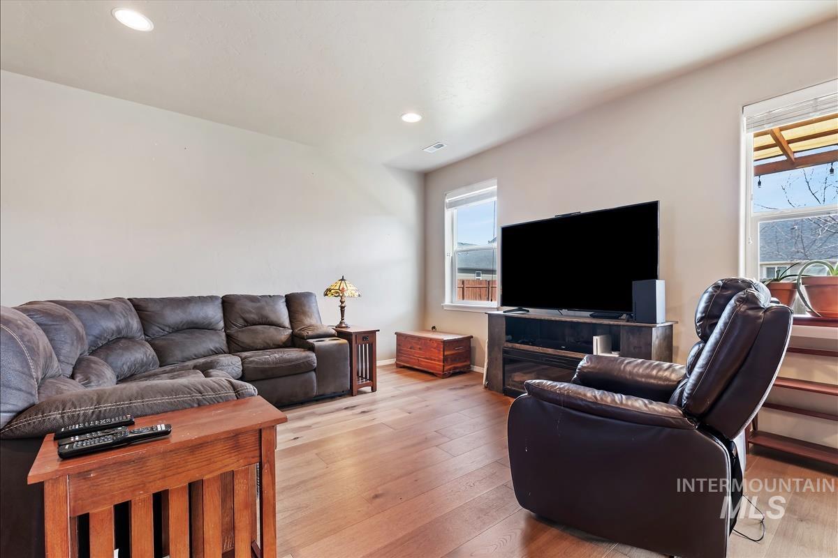 6308 South Kelso Way Boise, ID 83709 - Photo 4 of 35 Living area with light wood-style flooring and recessed lighting