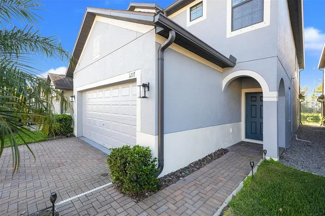 a view of a small house with a tub