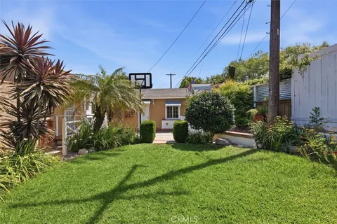 a house view with a garden space
