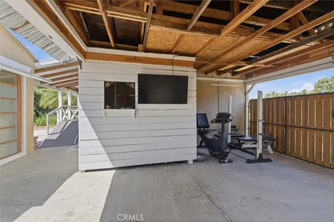 a view of a room with wooden walls