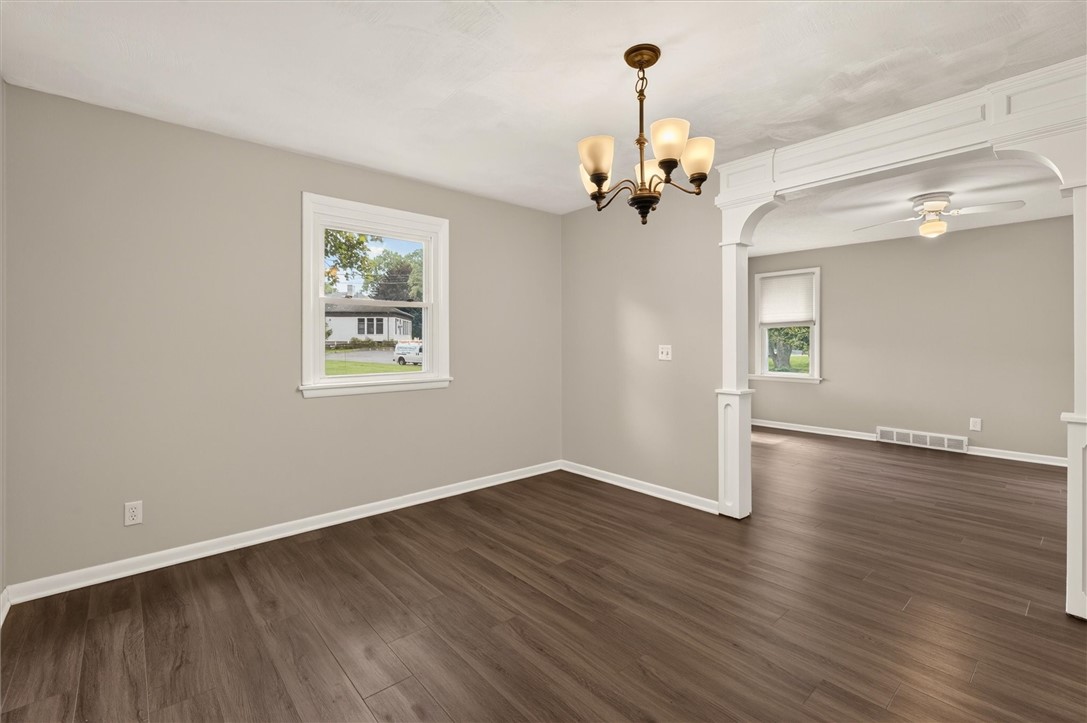 295 Penhurst Road Brighton, NY 14610 - Photo 12 of 42 Formal dining room opens up into the living room w
