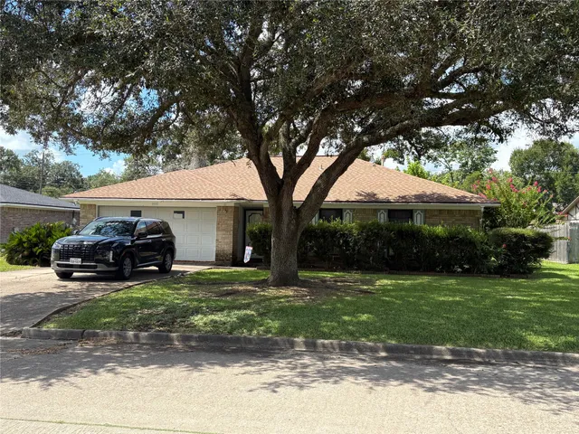 a view of a house with a yard porch and sitting area