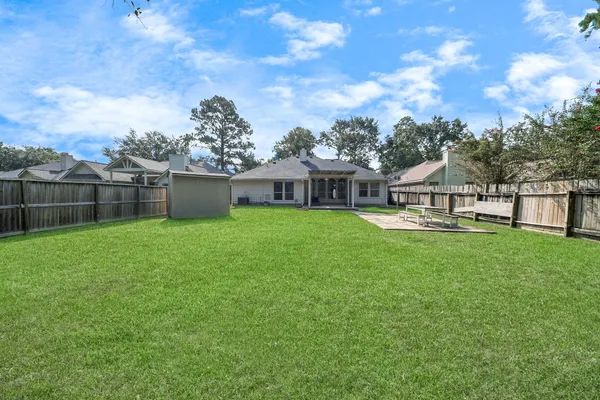 a view of a house with a big yard