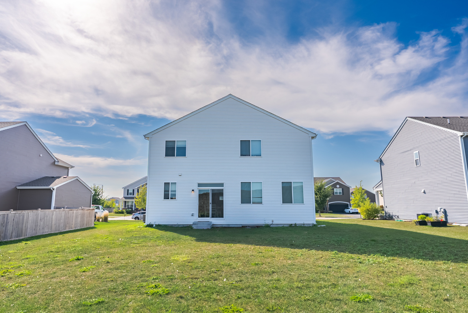 382 Hemlock Lane Oswego, IL 60543 - Photo 16 of 17 a house view with swimming pool and garden