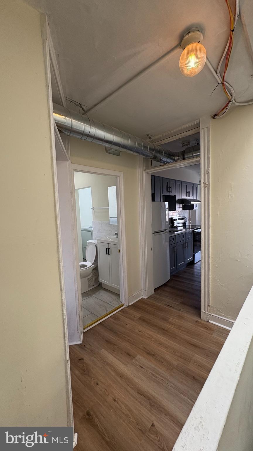 228 North 10th Street, Unit 4F Philadelphia, PA 19107 - Photo 2 of 9 a bedroom with a bed and closet