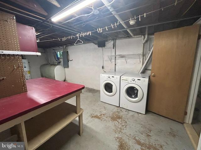 306 Kingston Road Baltimore, MD 21229 - Photo 17 of 17 a utility room with dryer and washer