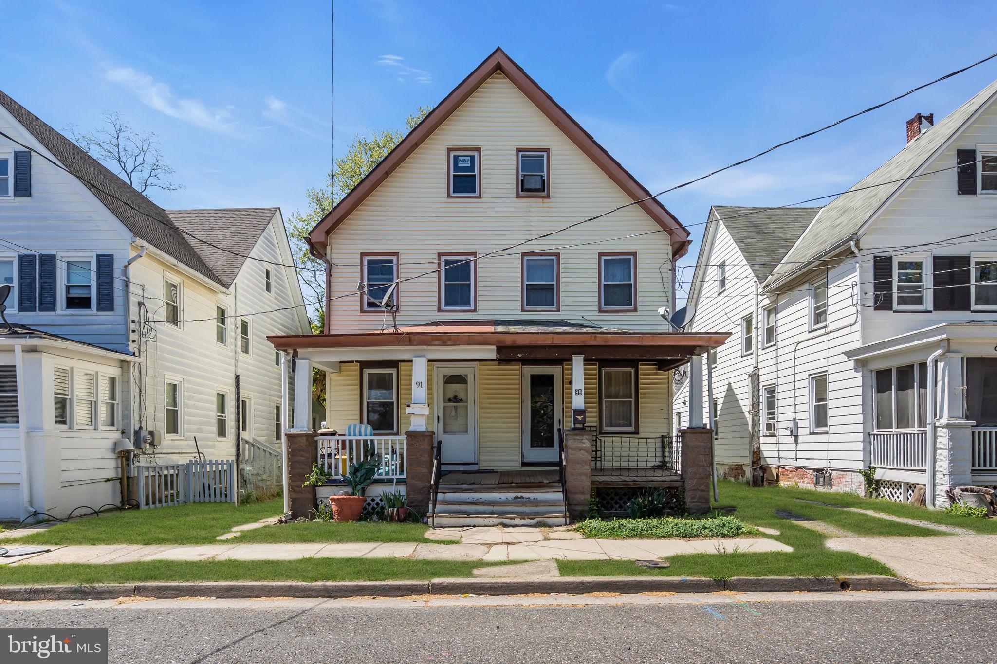 89 Chestnut Street Salem, NJ 08079 - Photo 1 of 20 a front view of a house with a yard