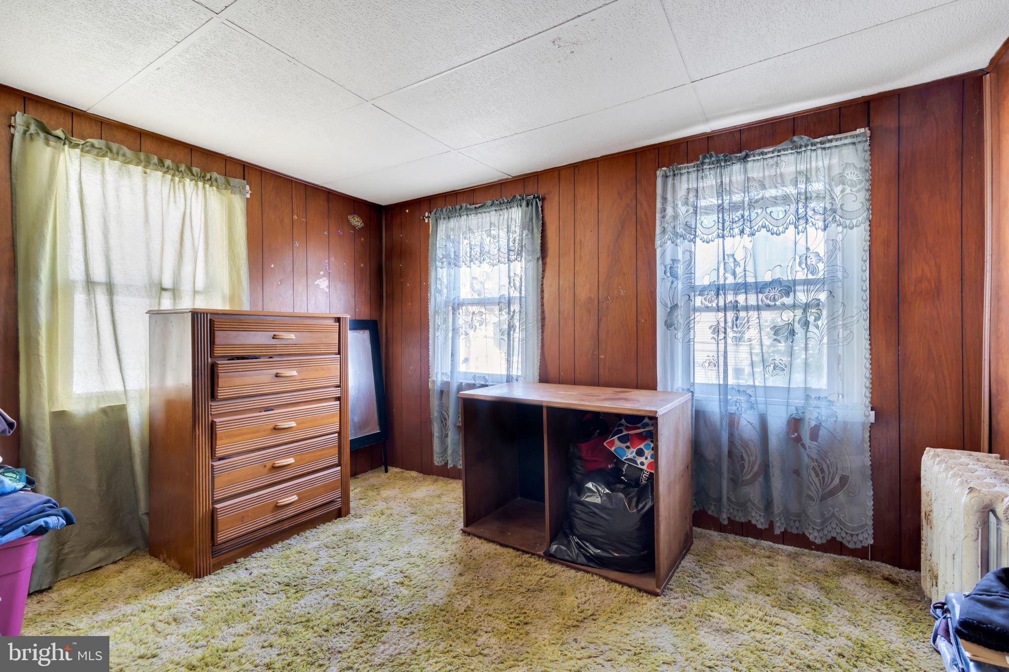 89 Chestnut Street Salem, NJ 08079 - Photo 11 of 20 a room with furniture and a dresser