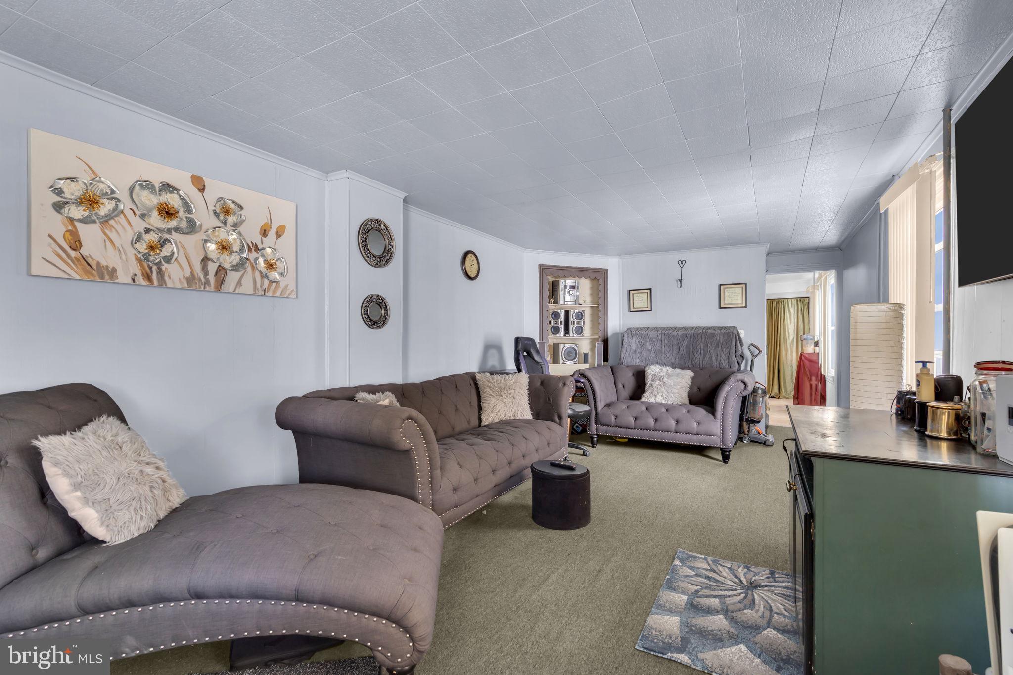 89 Chestnut Street Salem, NJ 08079 - Photo 7 of 20 a living room with furniture and a couch