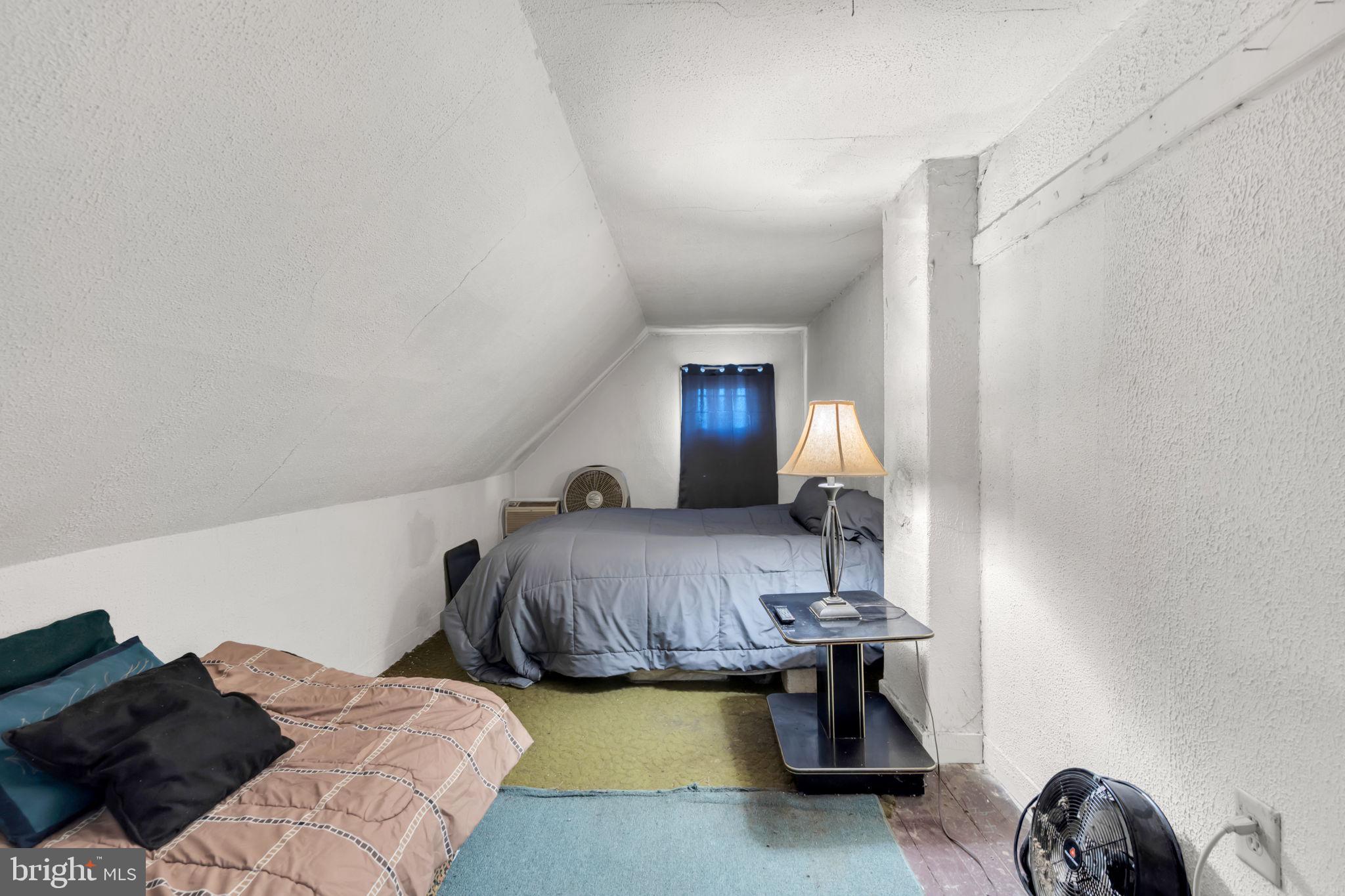 89 Chestnut Street Salem, NJ 08079 - Photo 10 of 20 a bedroom with bed and window