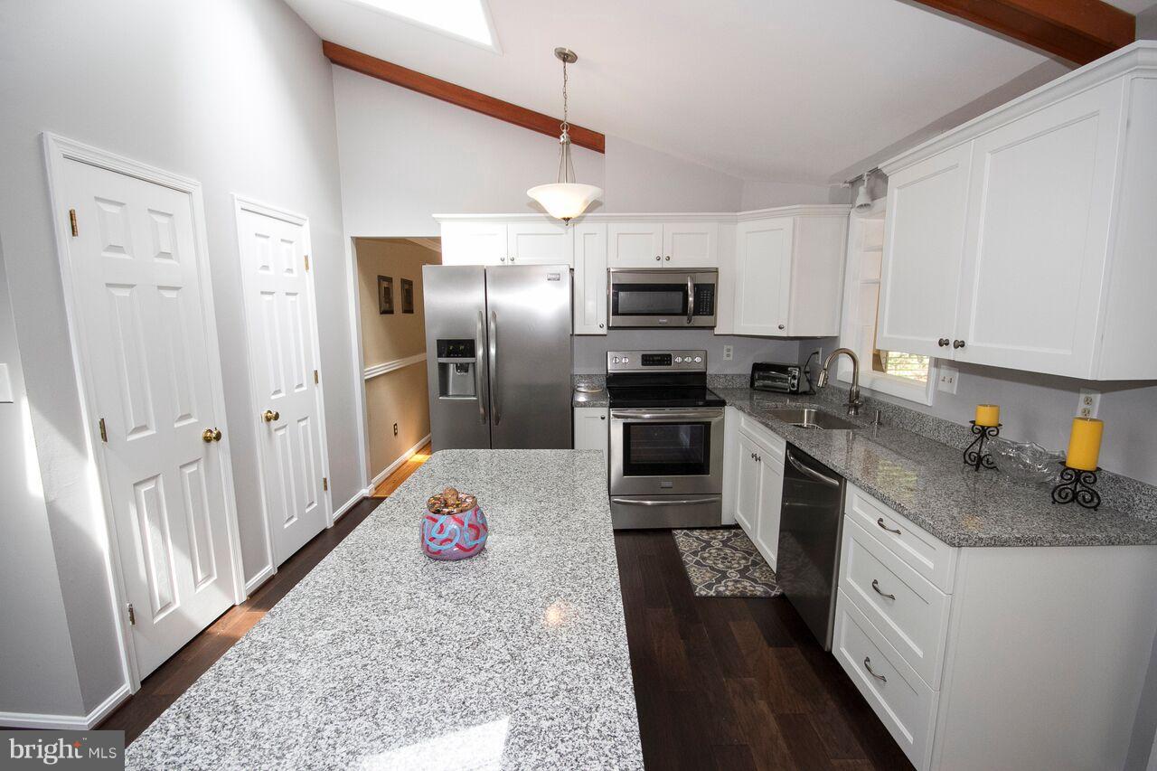 2215 Spring Lake Drive Lutherville-Timonium, MD 21093 - Photo 9 of 28 Granite counters and custom cabinets