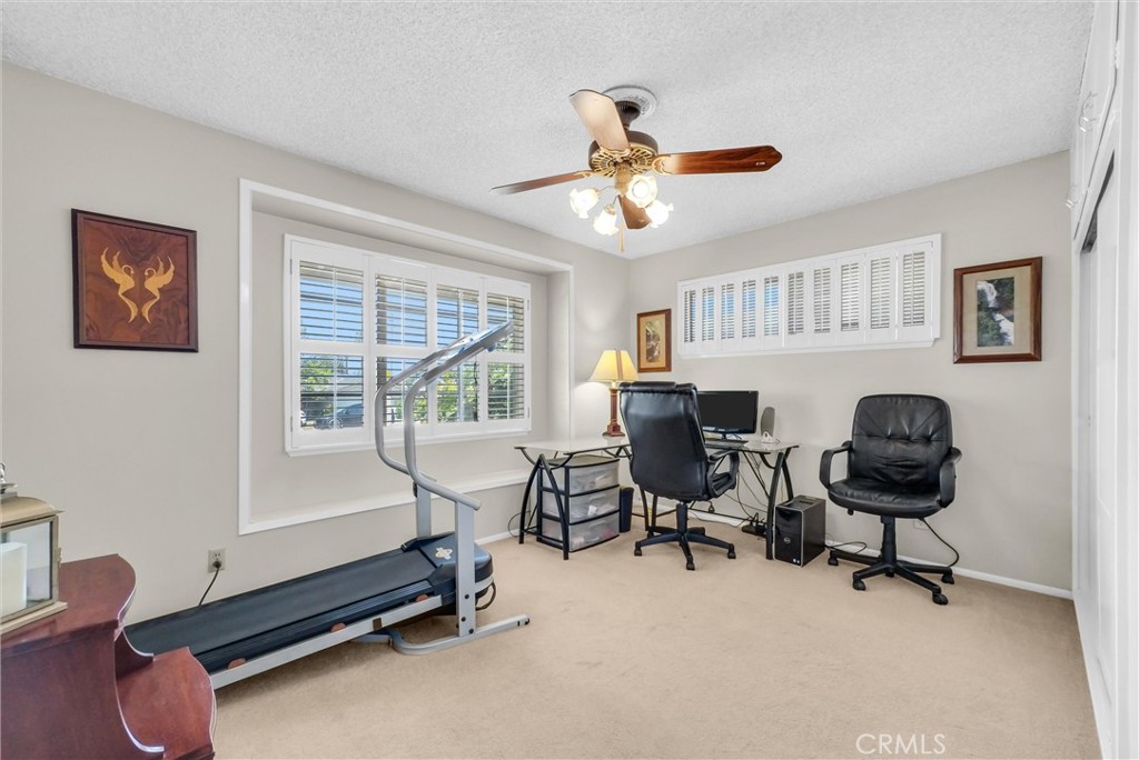 256 East Monterey Road Corona, CA 92879 - Photo 19 of 32 a work room with furniture and windows